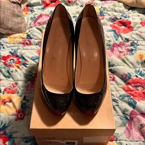 Christian Louboutin Black Heels with Red Accents